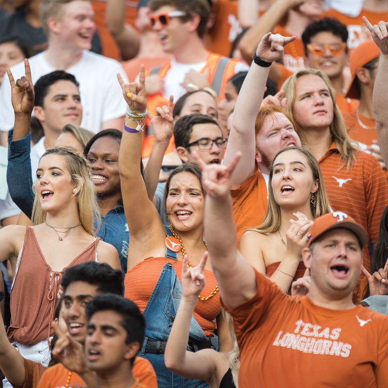 students-ut-football-game-hookem-texas-leader-magazine-spring-2019