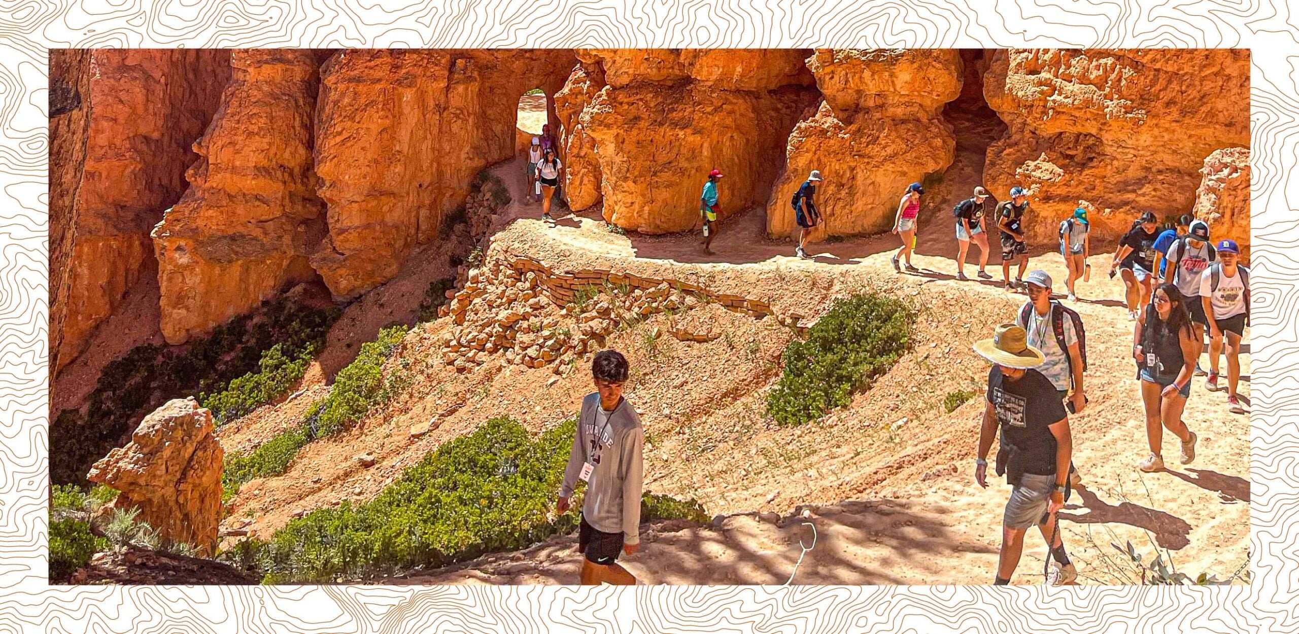 students hiking a trail