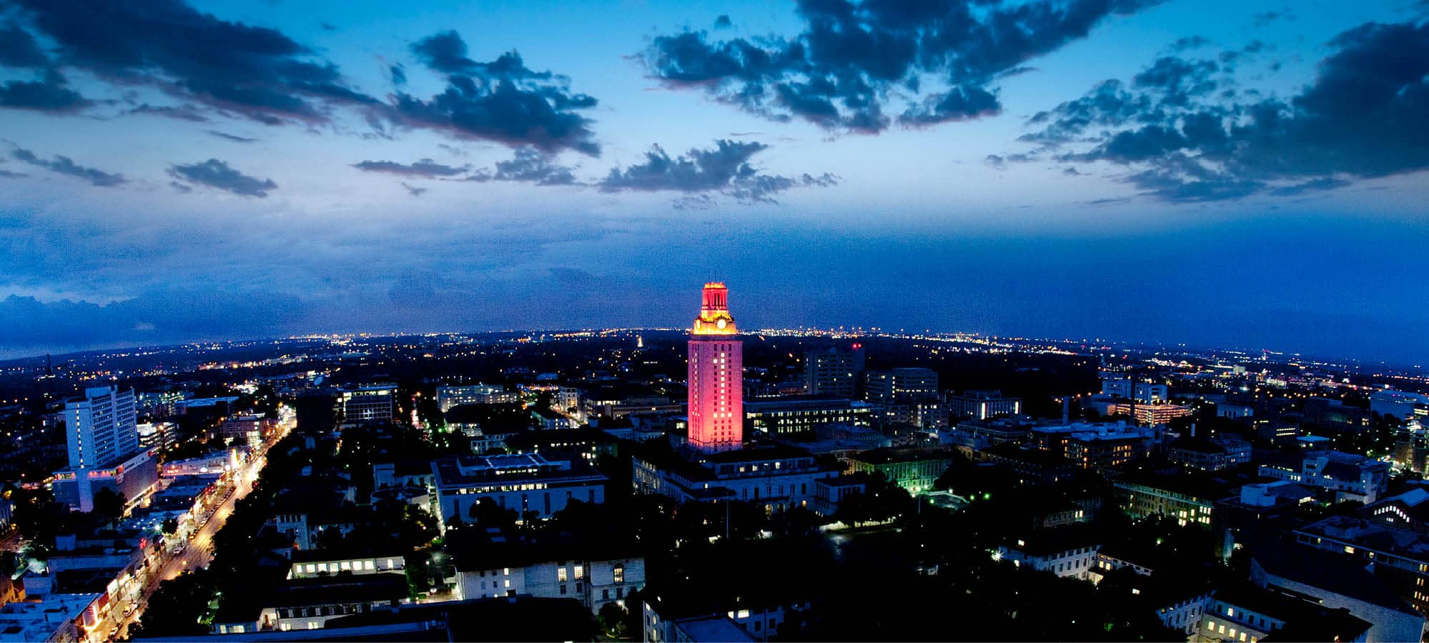 UT Tower lit up at night